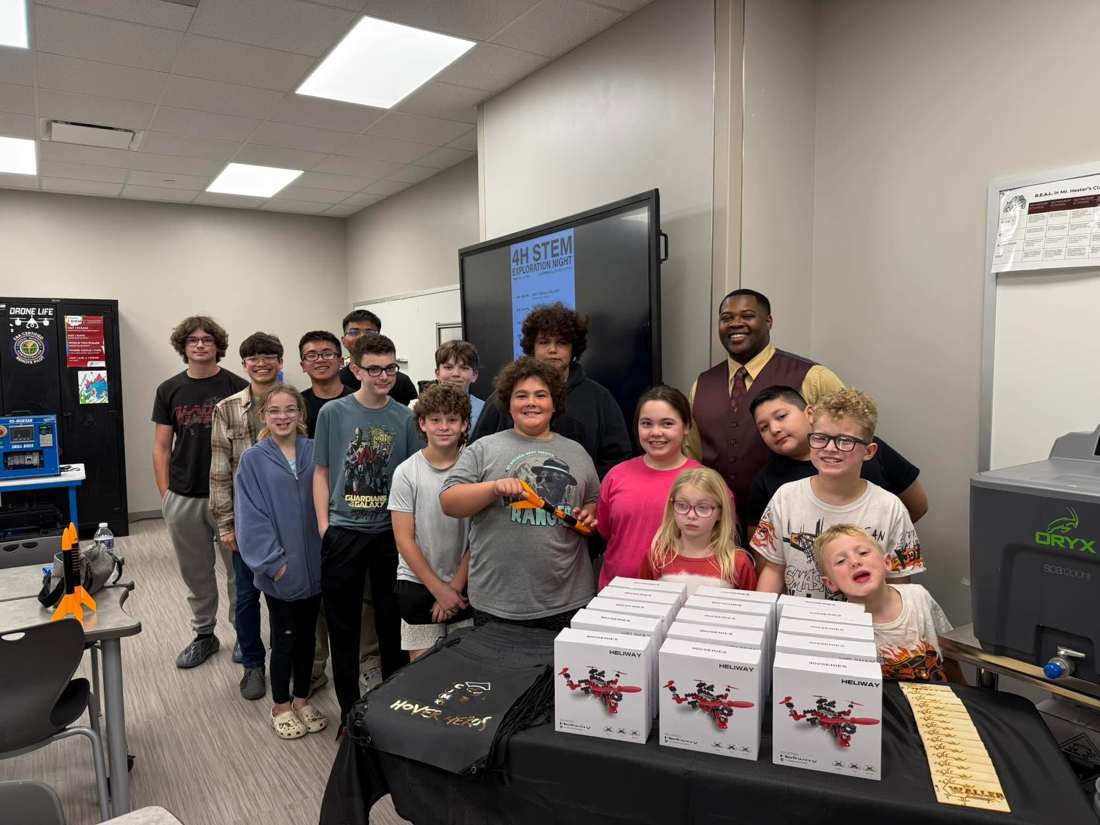 Waller Robotics students with the 4-H STEM club at a STEM Exploration Night